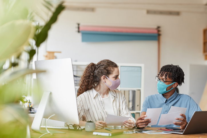 People Wearing Masks In Office
