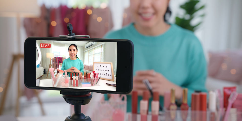 Woman Livestreaming Makeup Video