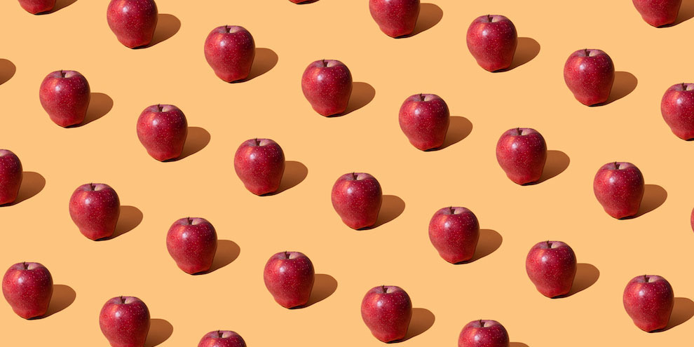 Apples On An Orange Background