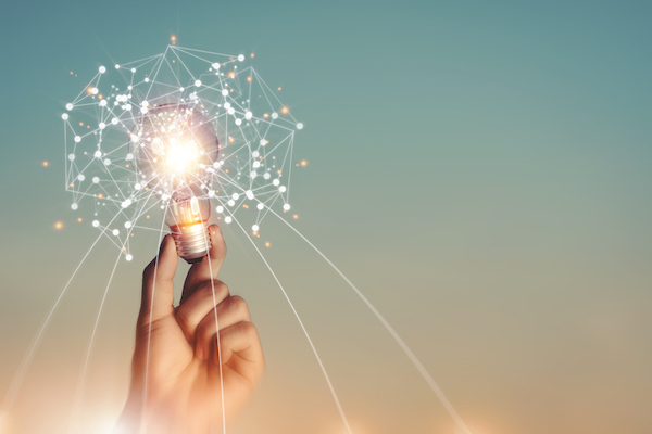 Light Bulb In Hand