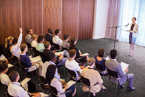 Mid Adult Businesswoman Giving Presentation In Conference Room Picture Id530685727