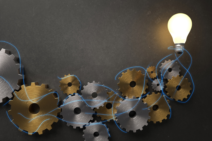 Innovation Theme   Gears And Light Bulb
