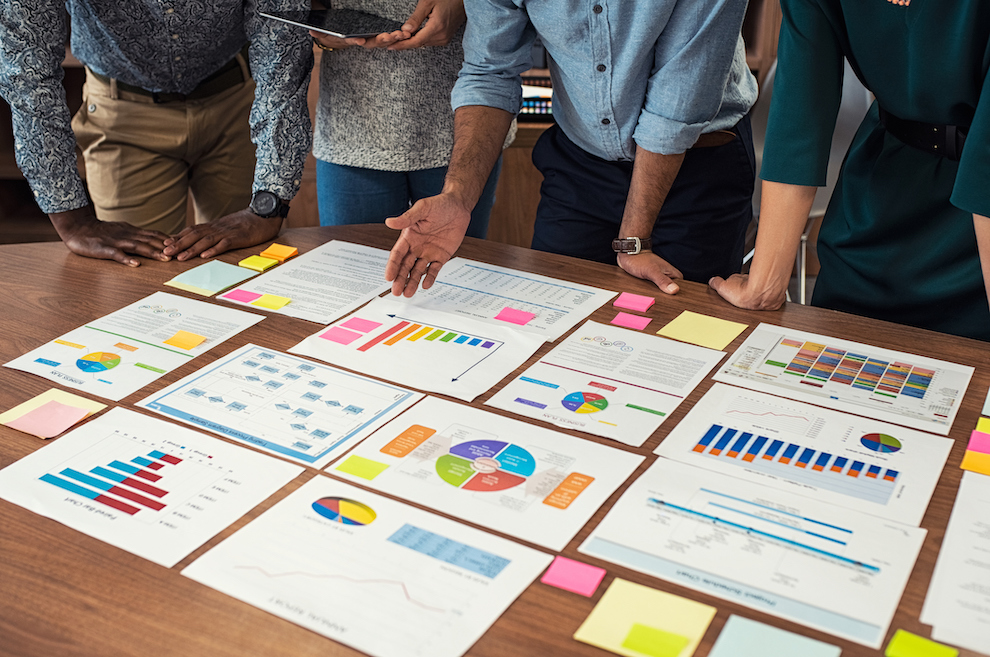 Business Casual Team Working On Graphs