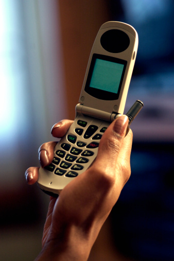 Hand Holding Cell Phone