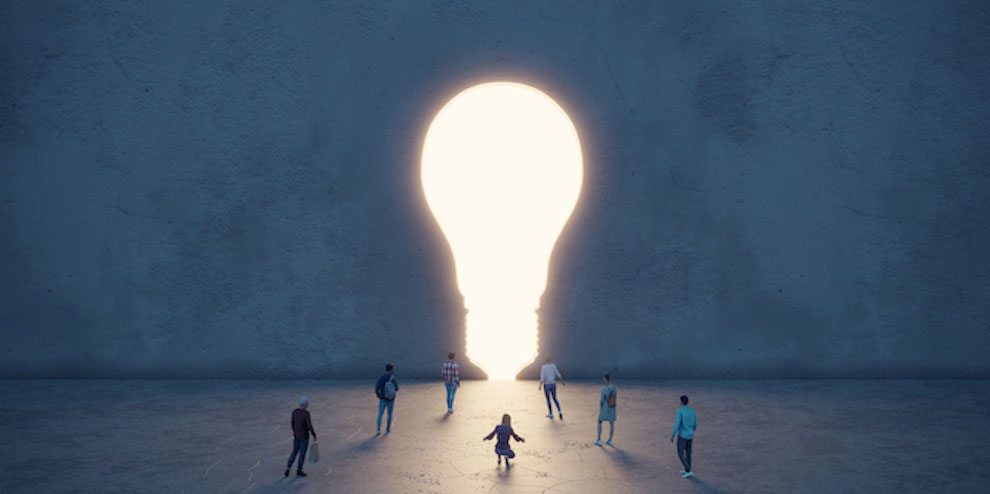 A Lightbulb Surrounded By People
