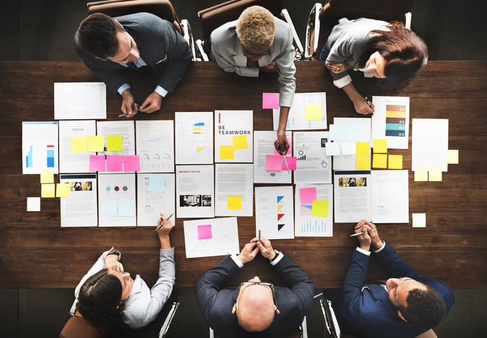 Business People Anlayzing Stats