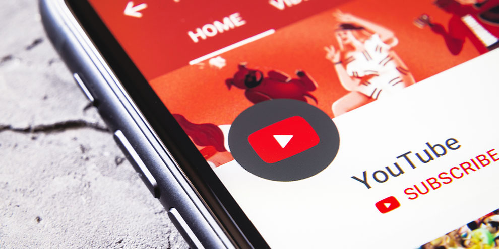 Iphone Sitting On Concrete Youtube Open On Phone