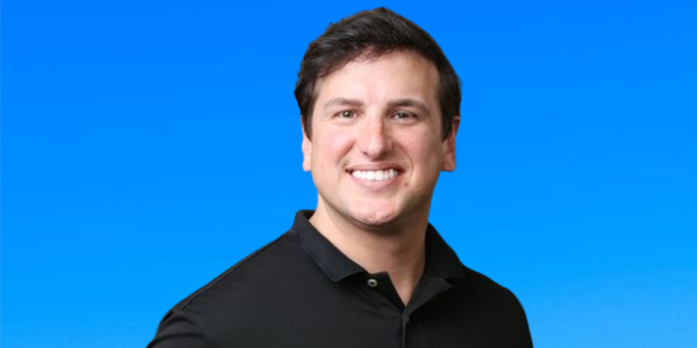 Headshot Timothy Cornelius Blue Background