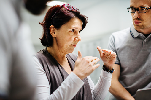 Mature Businesswoman Briefing Staff Picture Id648823037