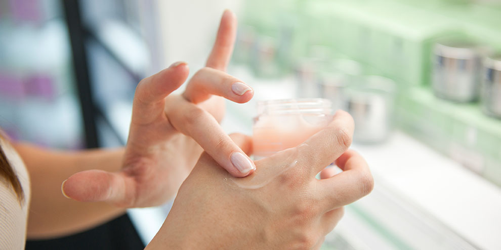 Person Testing Product On Hand