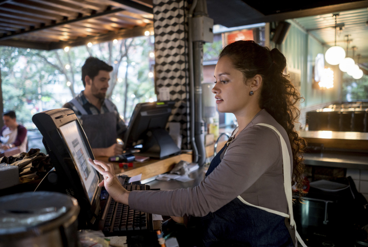 Woman Working At The Cashier