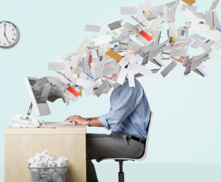 Businessmans Head Covered With Flying Paperwork Picture Id83665898