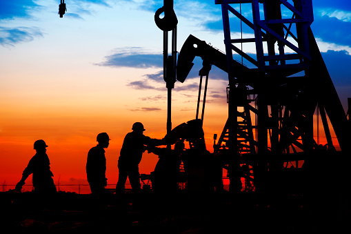 Oil Field The Oil Workers Are Working Picture Id493760870