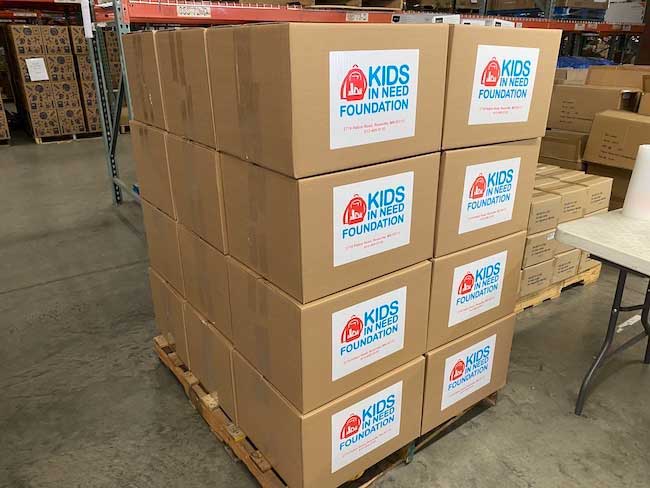 Quirk’s volunteers to pack backpacks for children in need gallery image 2