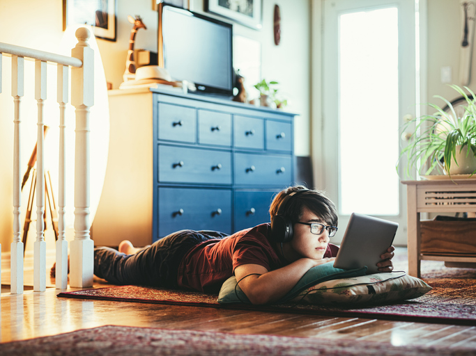 Teen On Tablet