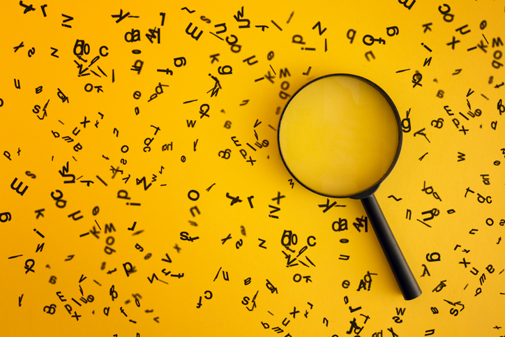 Magnifying With Wooden Alphabets